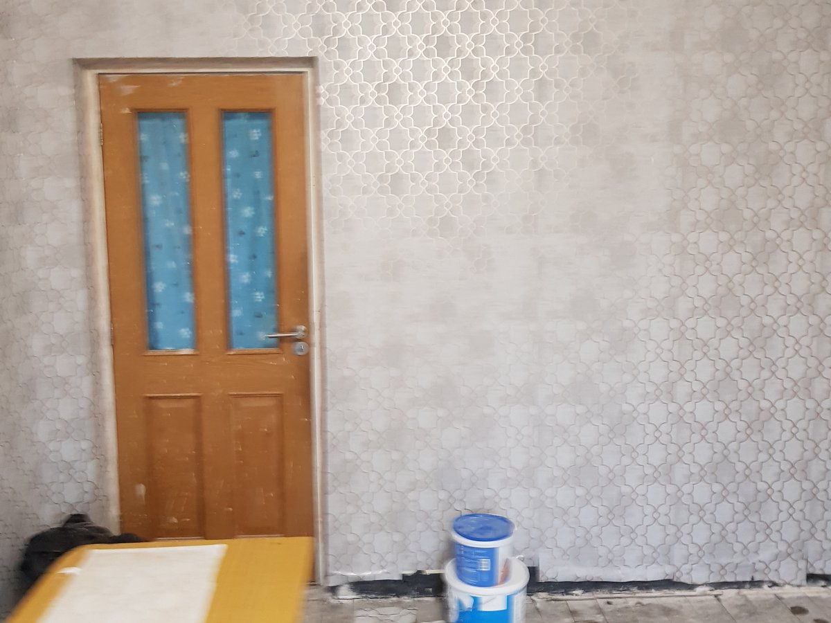 Wallpapering — real Yard Kings job photo